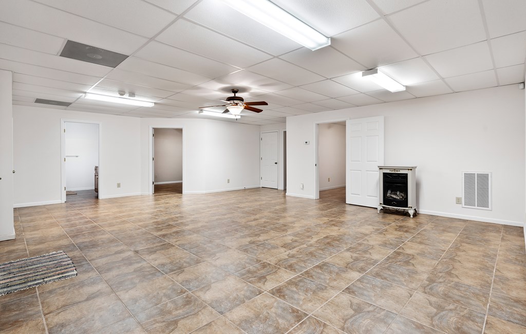 399 Hideaway Hills Road Blairsville, GA 30512 - Photo 67 of 77 a view of an empty room with a chandelier