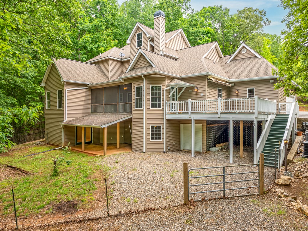 399 Hideaway Hills Road Blairsville, GA 30512 - Photo 10 of 77 an aerial view of a house with a yard