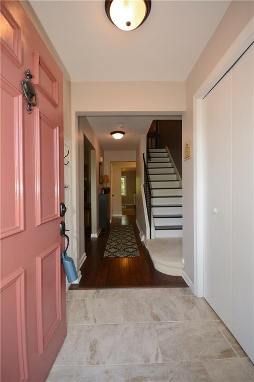 216 Falls Village Road Plum, PA 15239 - Photo 2 of 25 Beautiful entryway, coat hooks and wainscoting behind the door!