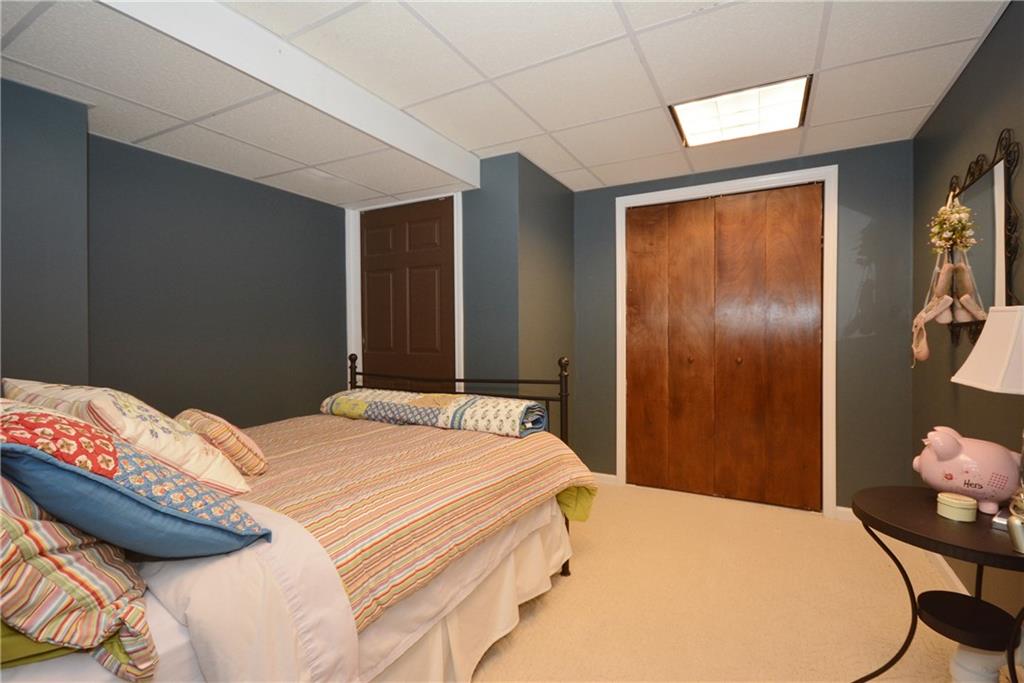 216 Falls Village Road Plum, PA 15239 - Photo 23 of 25 Den in the basement currently being used as a bedroom, plenty of closet space as well!