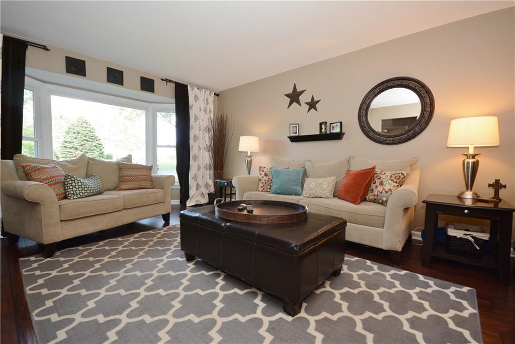 216 Falls Village Road Plum, PA 15239 - Photo 4 of 25 Spacious living room with wonderful lighting from Bay window