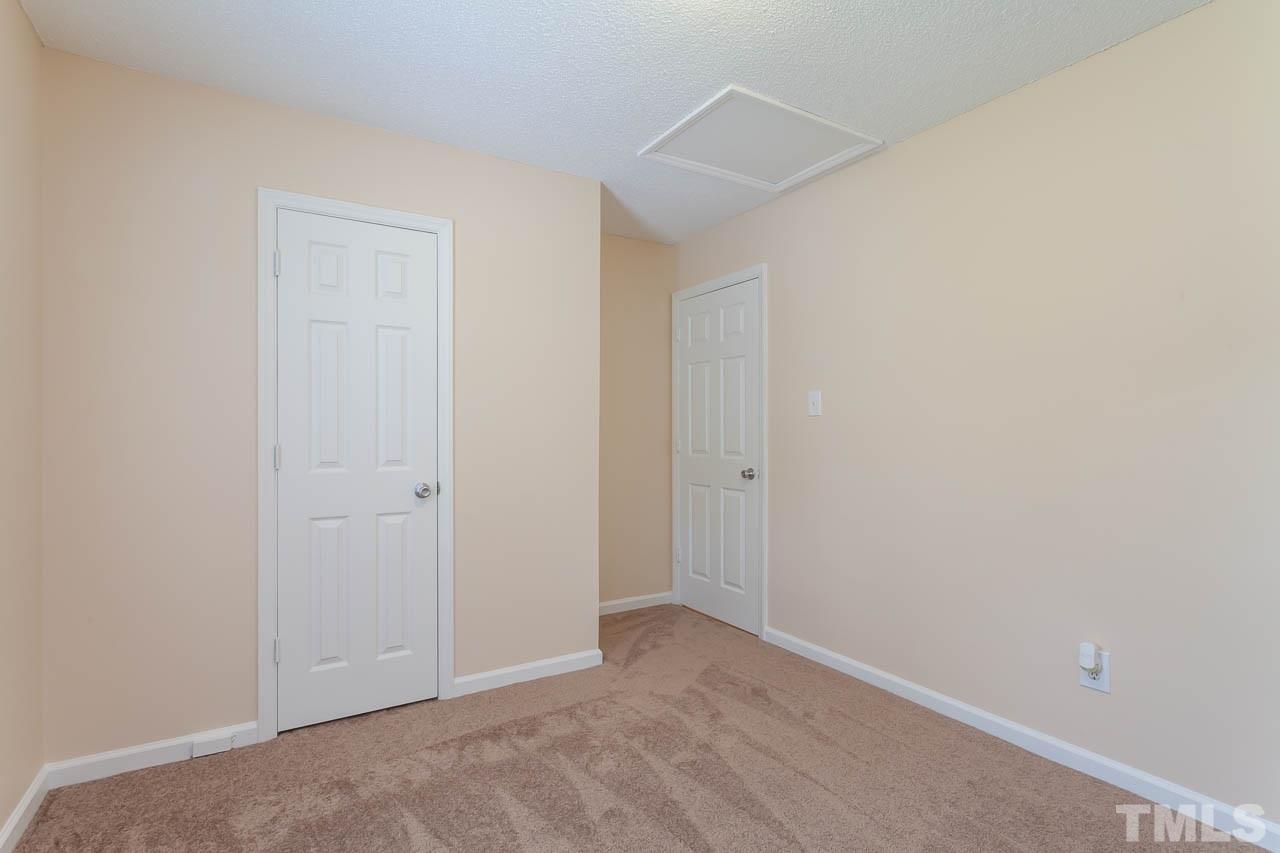 1388 Lee Road Clayton, NC 27520 - Photo 14 of 24 a view of an empty room
