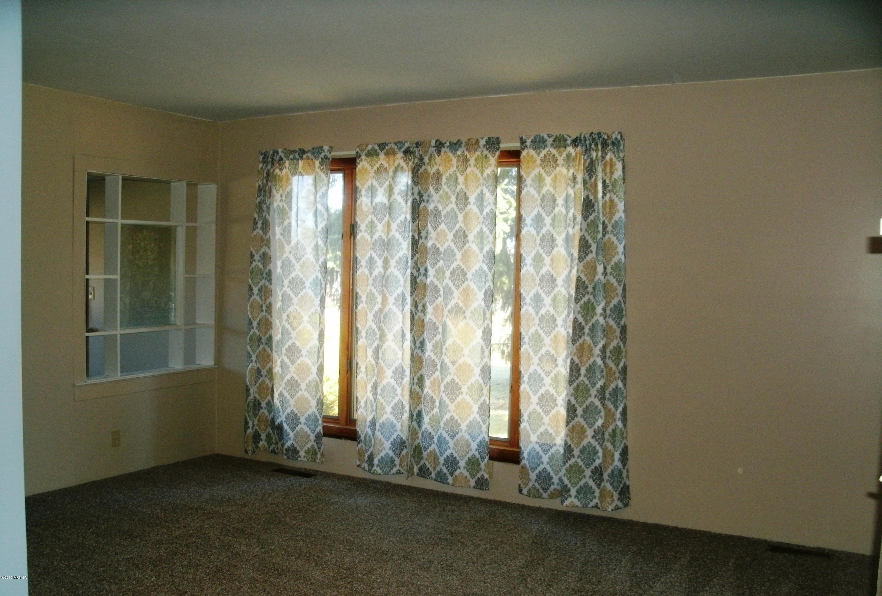 161 West Sidney Road Sidney, MI 48885 - Photo 12 of 18 Living Room - partial view