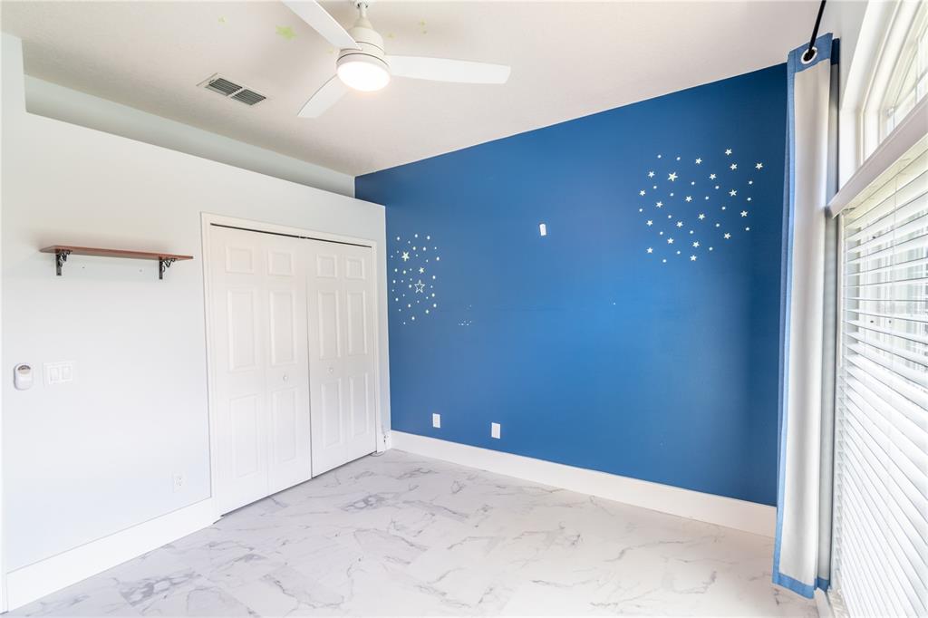 3862 Beacon Ridge Way Clermont, FL 34711 - Photo 36 of 56 a view of an empty room with a window
