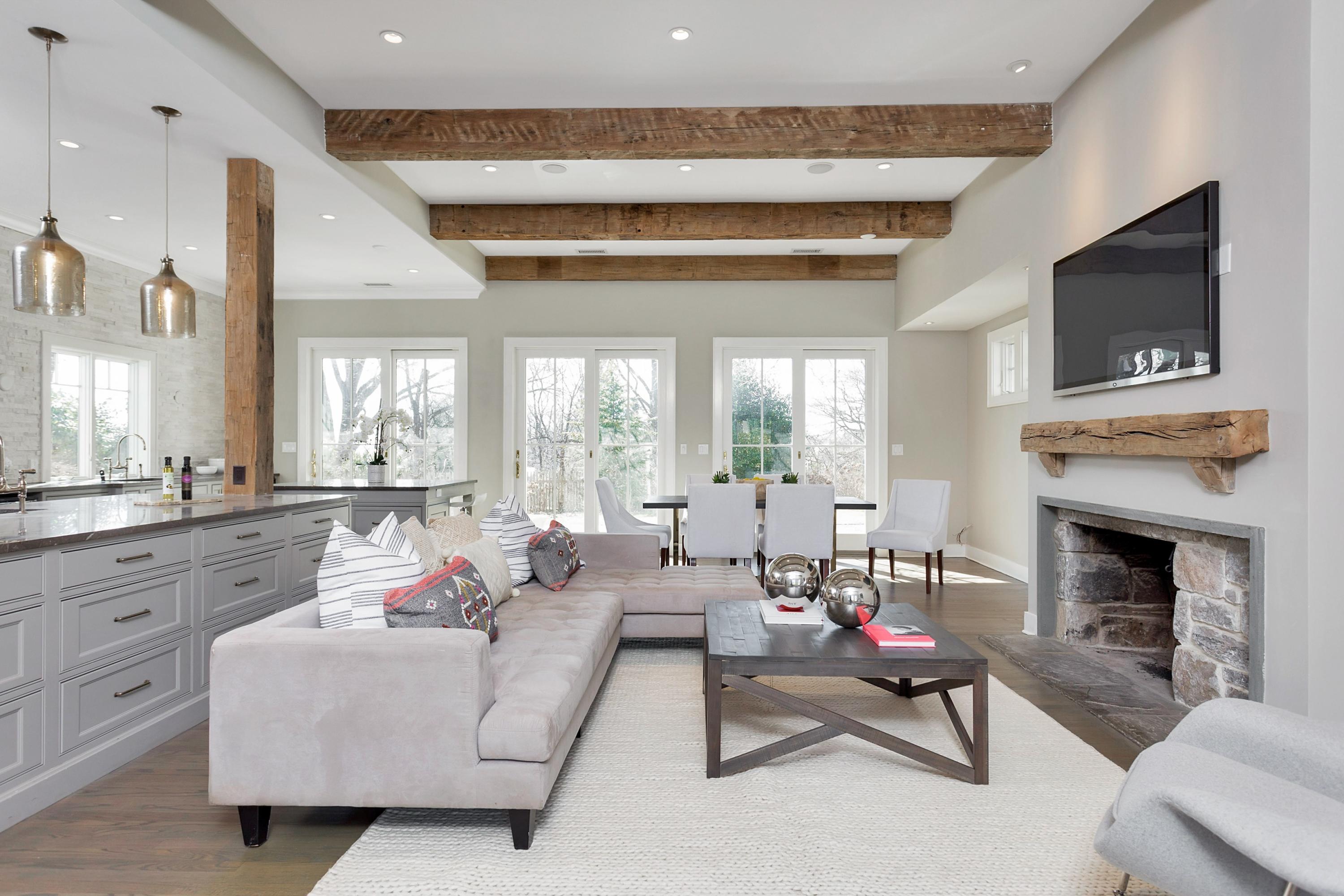 9 Searles Road Darien, CT 06820 - Photo 14 of 40 a living room with furniture and a fireplace