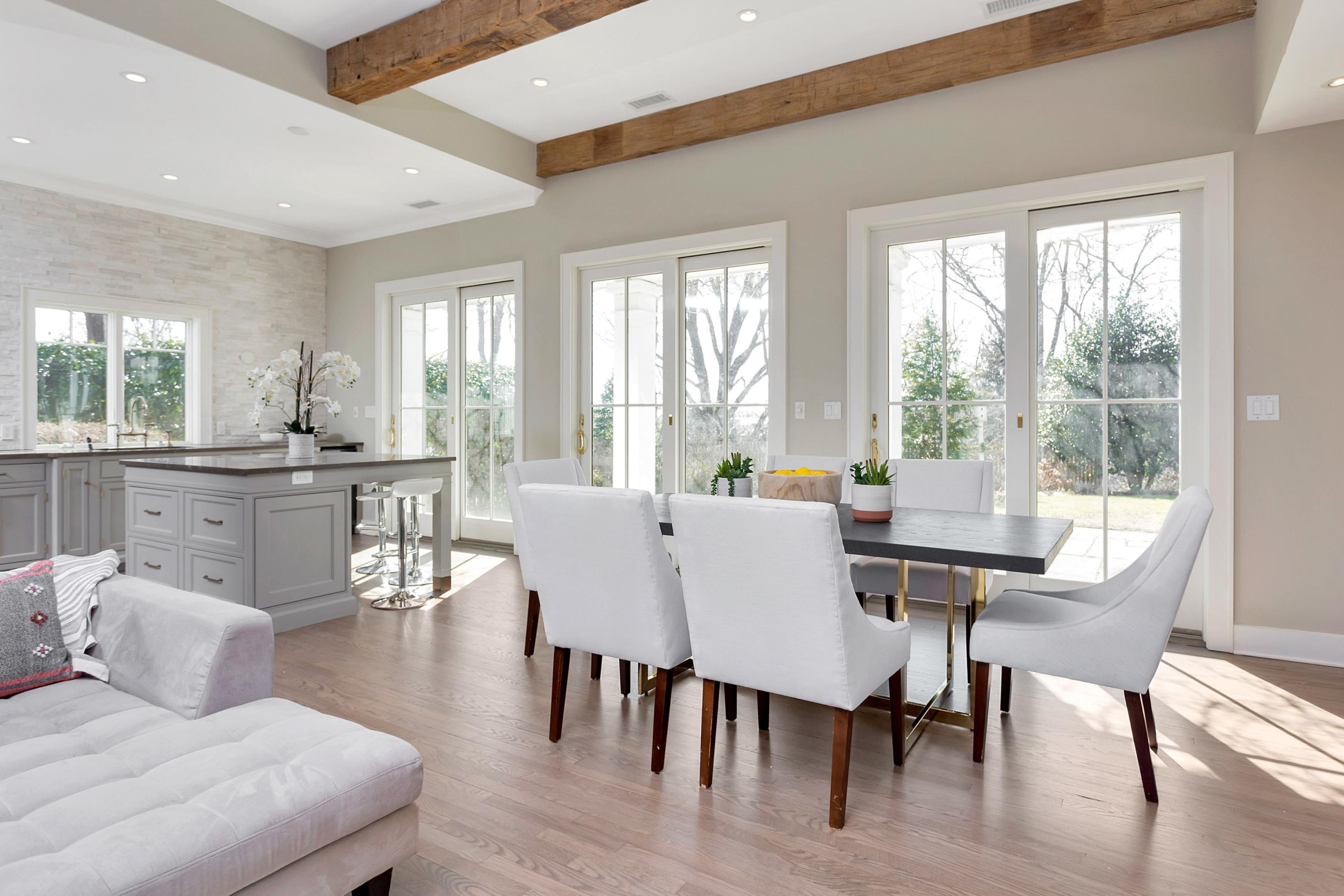 9 Searles Road Darien, CT 06820 - Photo 15 of 40 a view of a dining room with furniture window and outside view