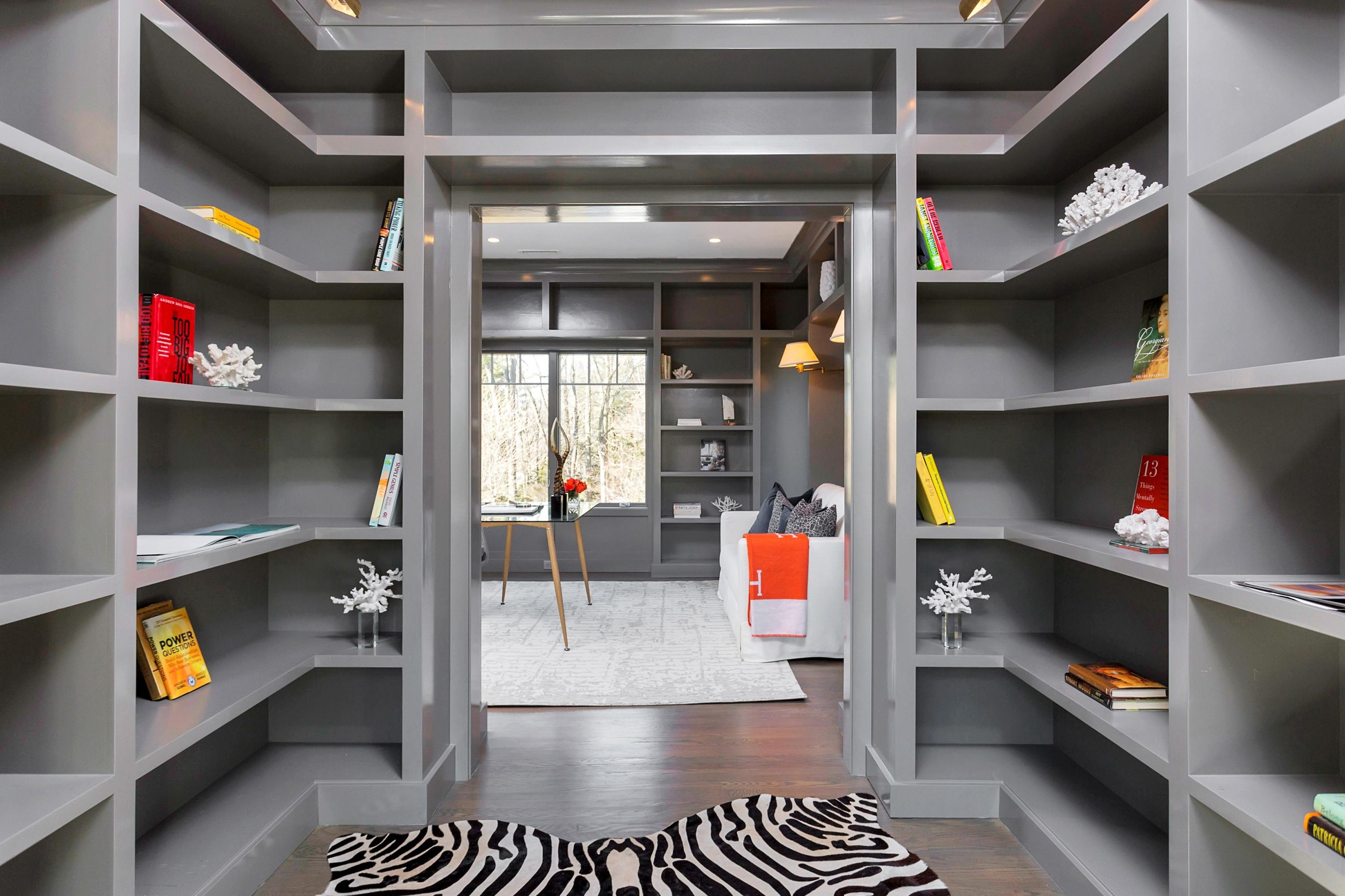 9 Searles Road Darien, CT 06820 - Photo 18 of 40 a view of walk in closet with clothes and shoes