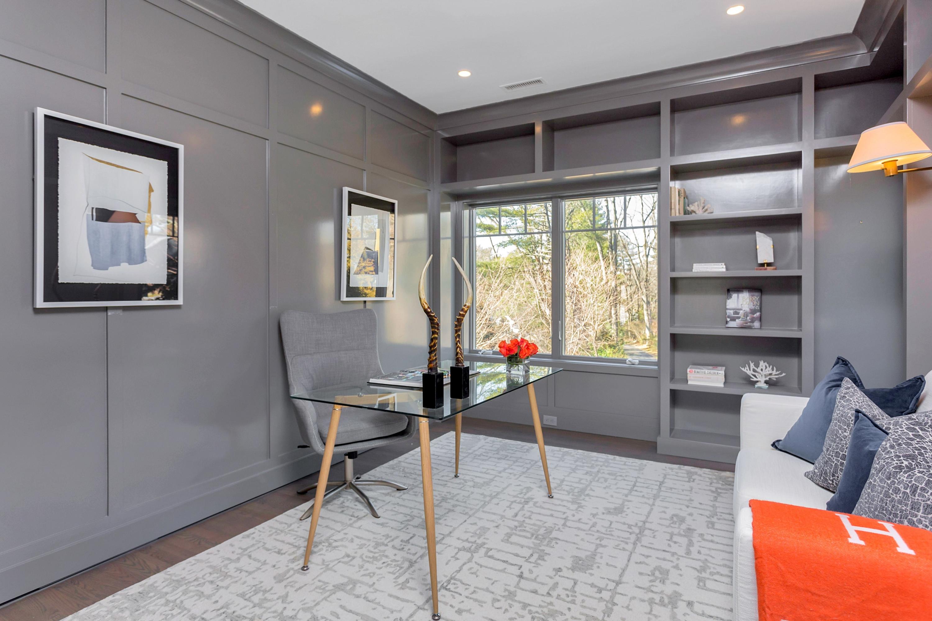 9 Searles Road Darien, CT 06820 - Photo 20 of 40 a living room with furniture and a large window