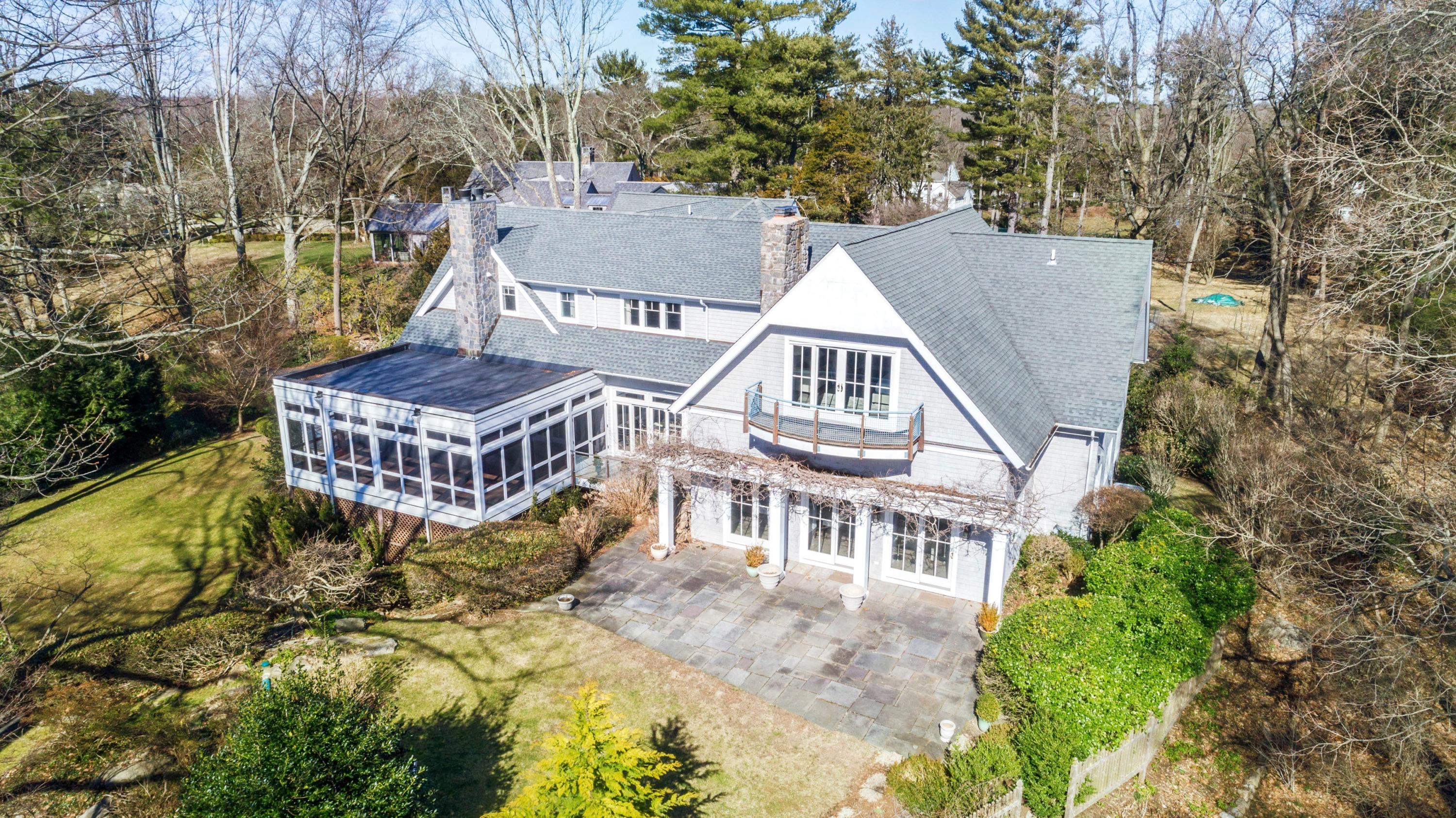 9 Searles Road Darien, CT 06820 - Photo 35 of 40 an aerial view of a house with swimming pool and porch