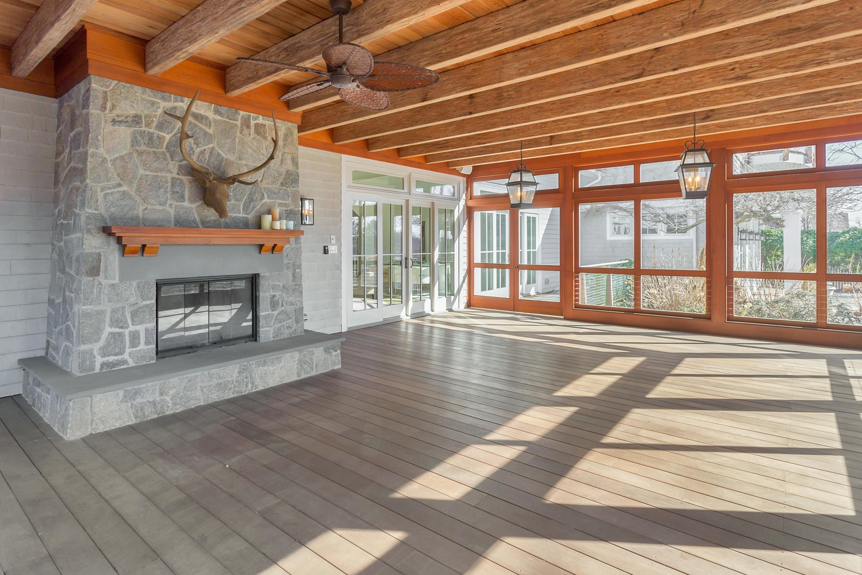 9 Searles Road Darien, CT 06820 - Photo 10 of 40 a view of an empty room with wooden floor and a window