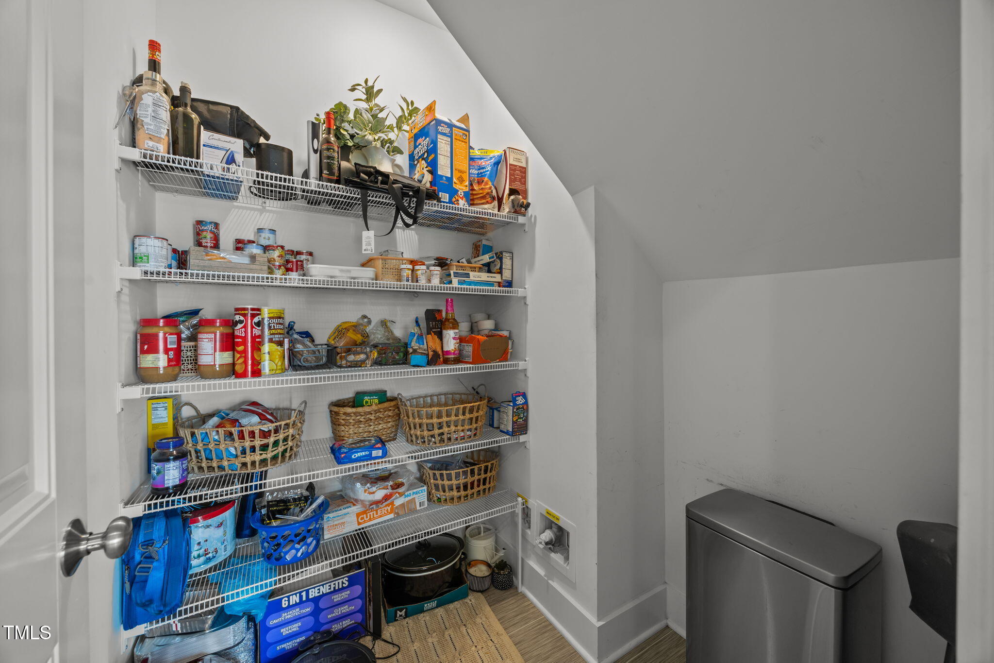 456 Highview Drive Benson, NC 27504 - Photo 12 of 36 a shelf with books and knick knacks on it