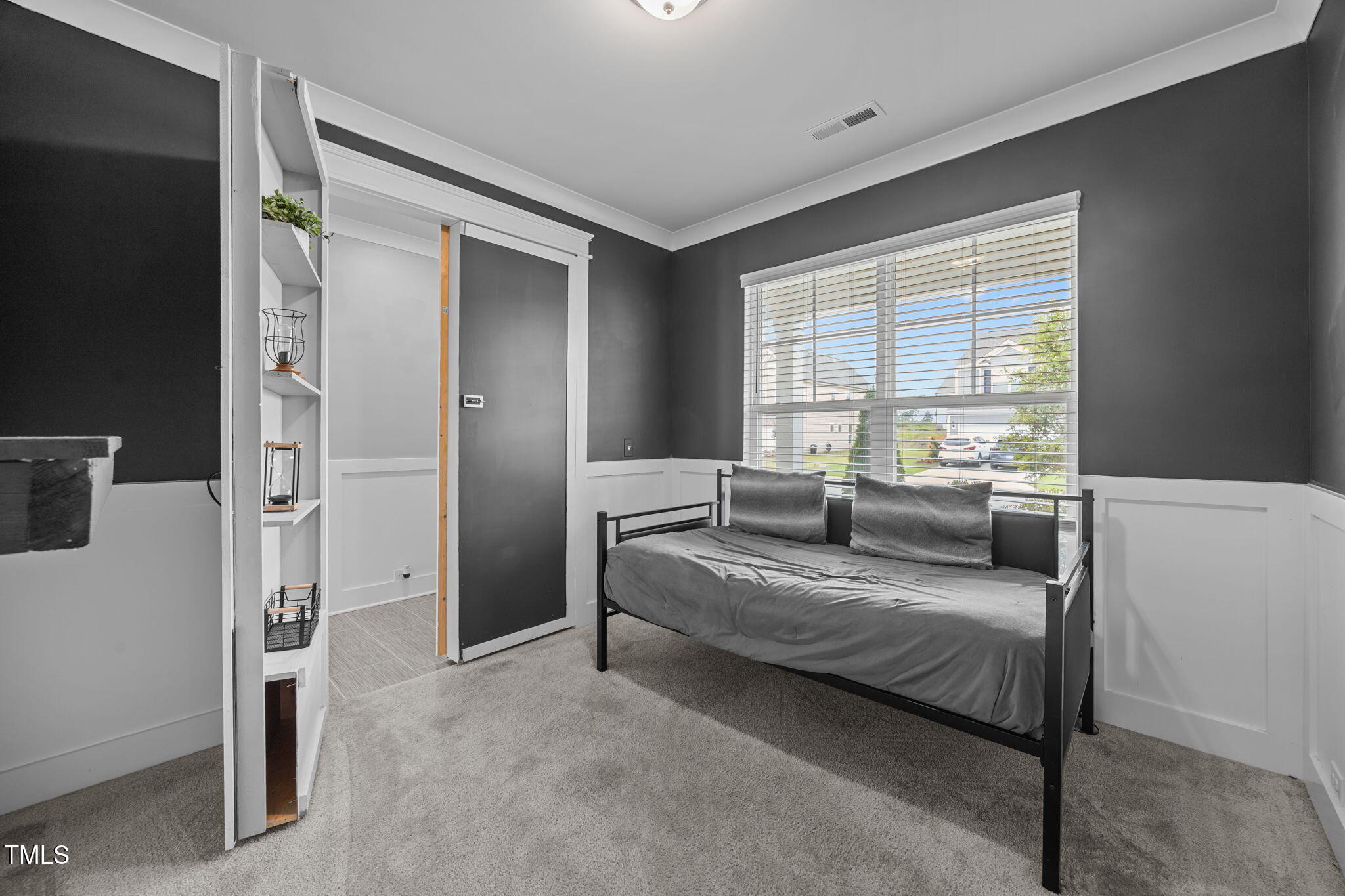 456 Highview Drive Benson, NC 27504 - Photo 14 of 36 a bedroom with a bed and a couch