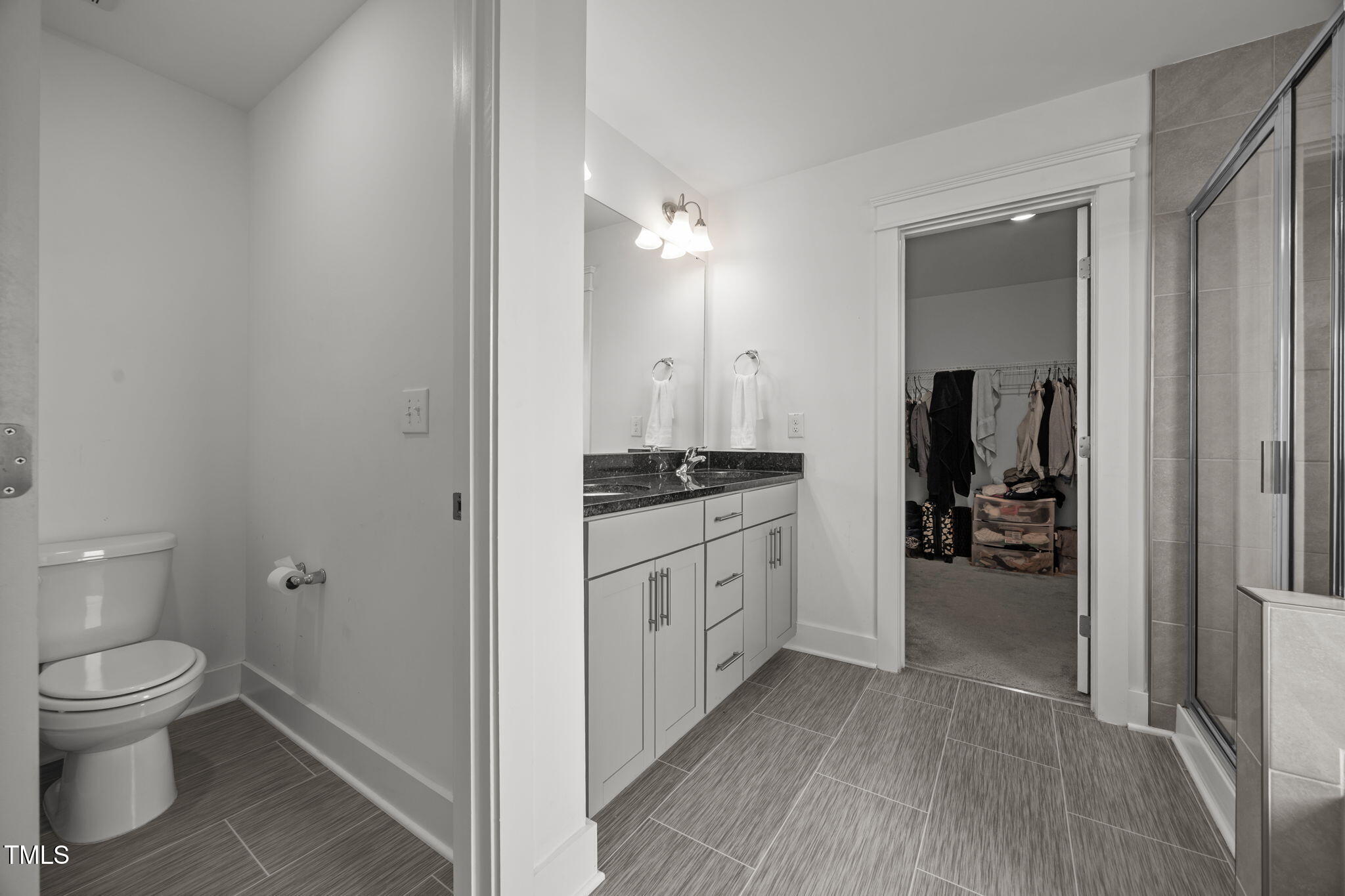456 Highview Drive Benson, NC 27504 - Photo 18 of 36 a bathroom with a granite countertop sink toilet and shower