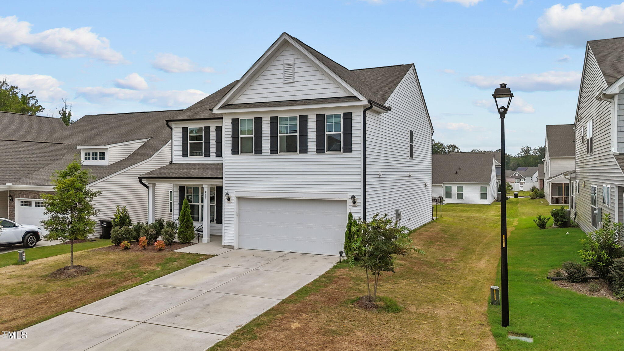 456 Highview Drive Benson, NC 27504 - Photo 30 of 36 a front view of a house with a yard