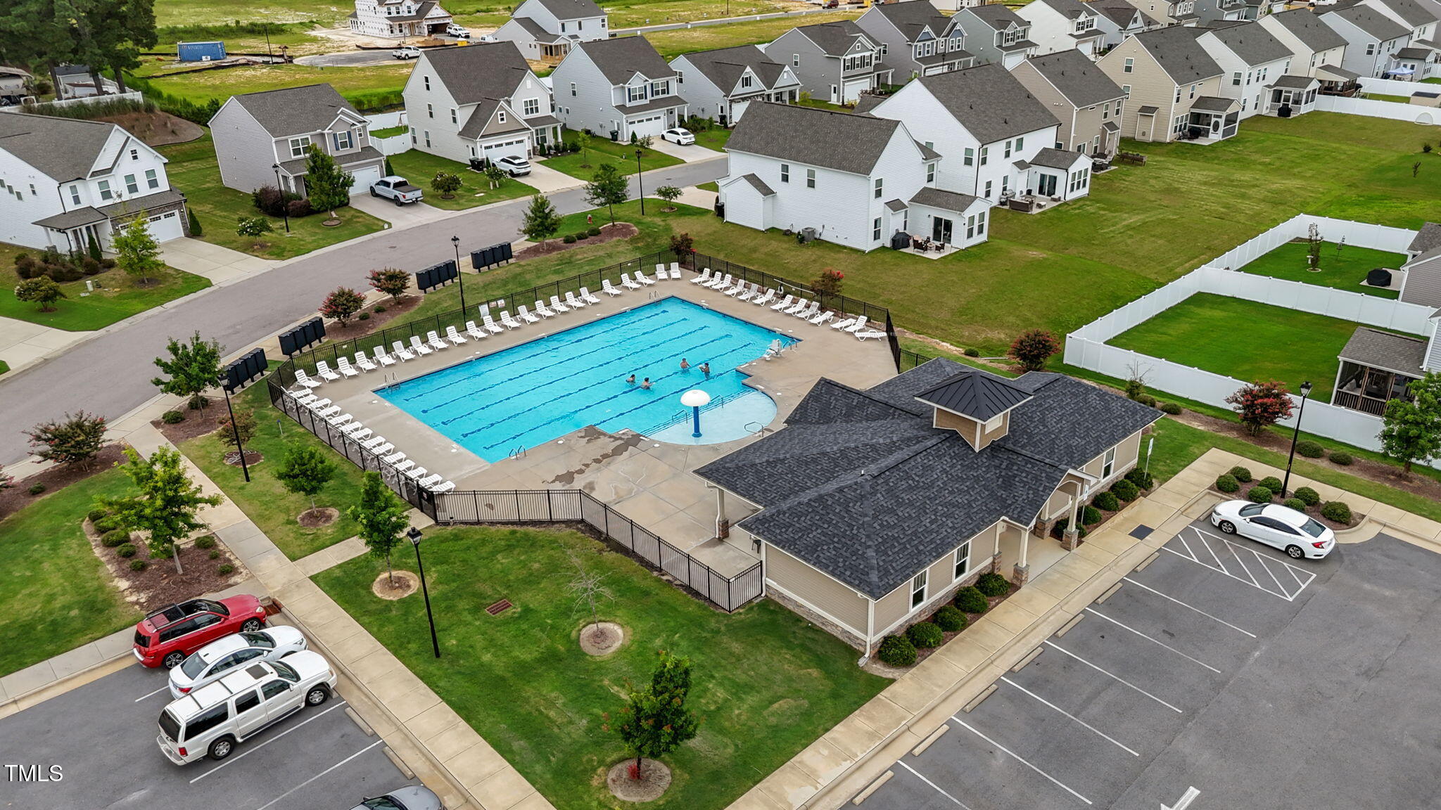 456 Highview Drive Benson, NC 27504 - Photo 36 of 36 an aerial view of a house with a garden and lake view