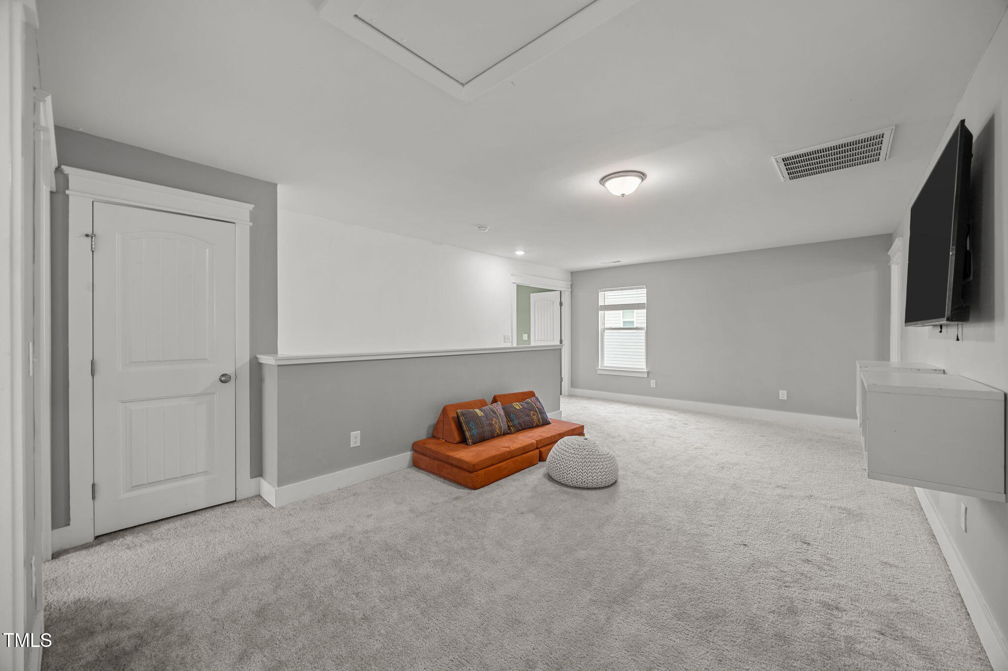 456 Highview Drive Benson, NC 27504 - Photo 4 of 36 a living room with furniture and a flat screen tv