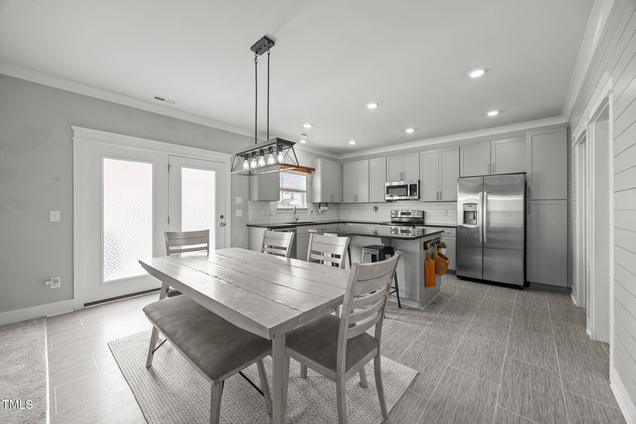 456 Highview Drive Benson, NC 27504 - Photo 5 of 36 a kitchen with refrigerator a center island a stove and a cabinets