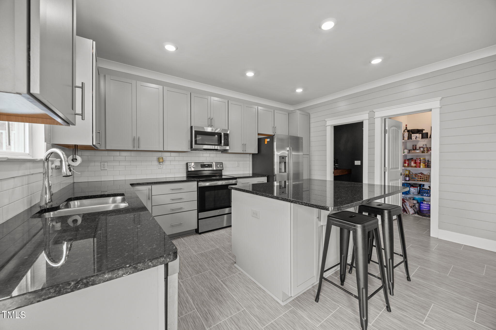 456 Highview Drive Benson, NC 27504 - Photo 6 of 36 a kitchen with granite countertop a sink stainless steel appliances and cabinets