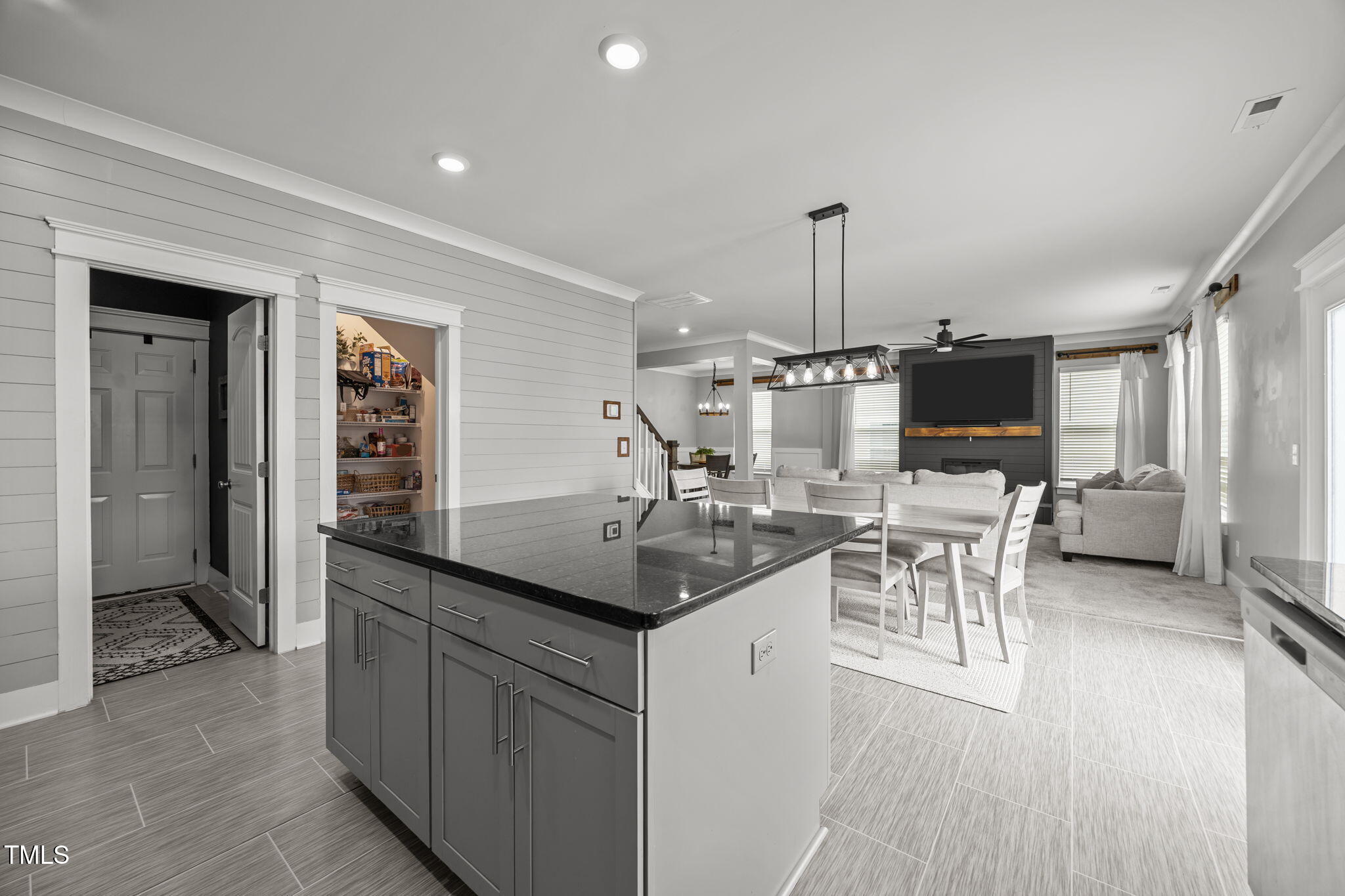 456 Highview Drive Benson, NC 27504 - Photo 7 of 36 a kitchen with counter space dining table and chairs
