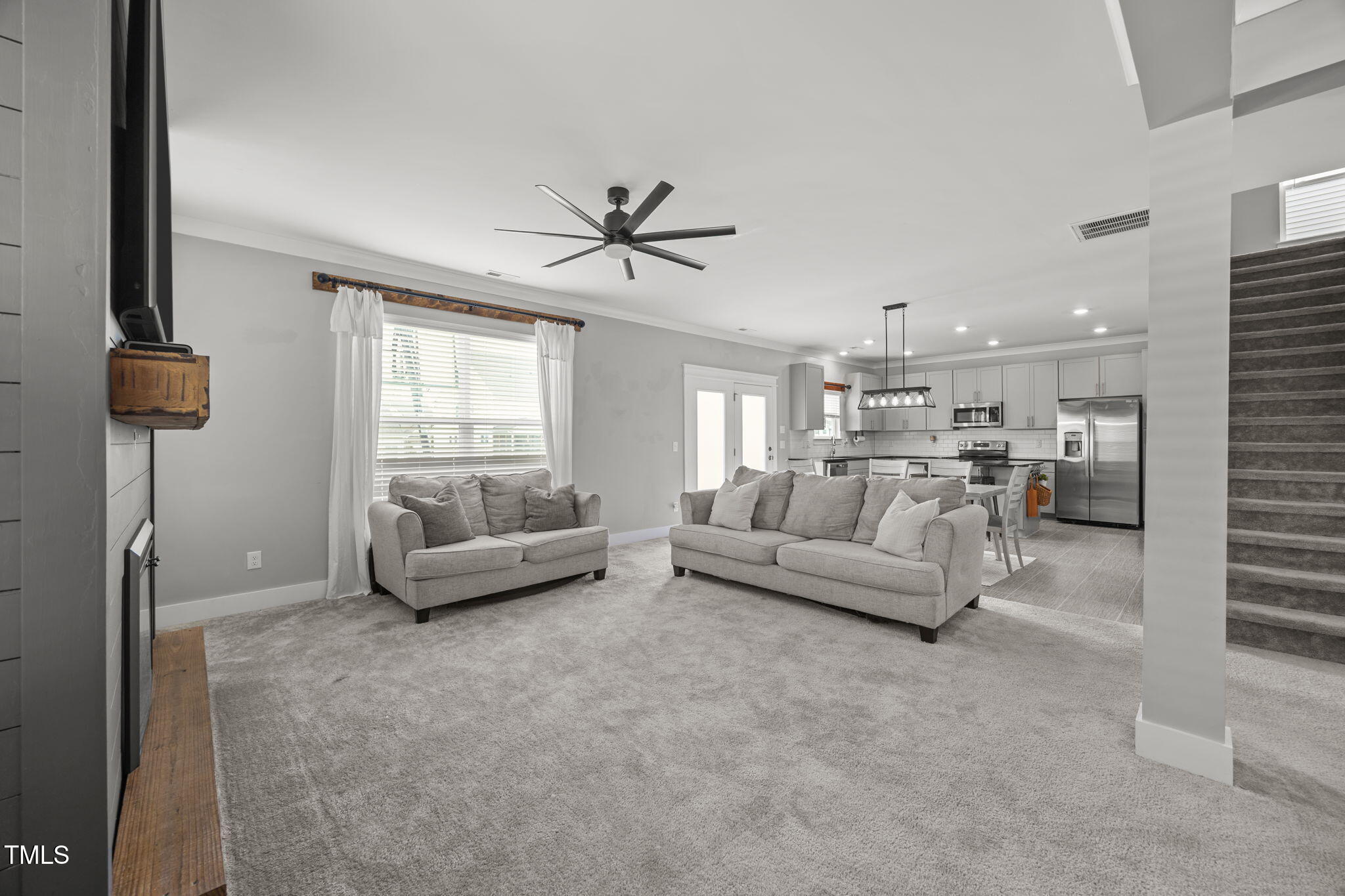 456 Highview Drive Benson, NC 27504 - Photo 8 of 36 a living room with furniture and a large window
