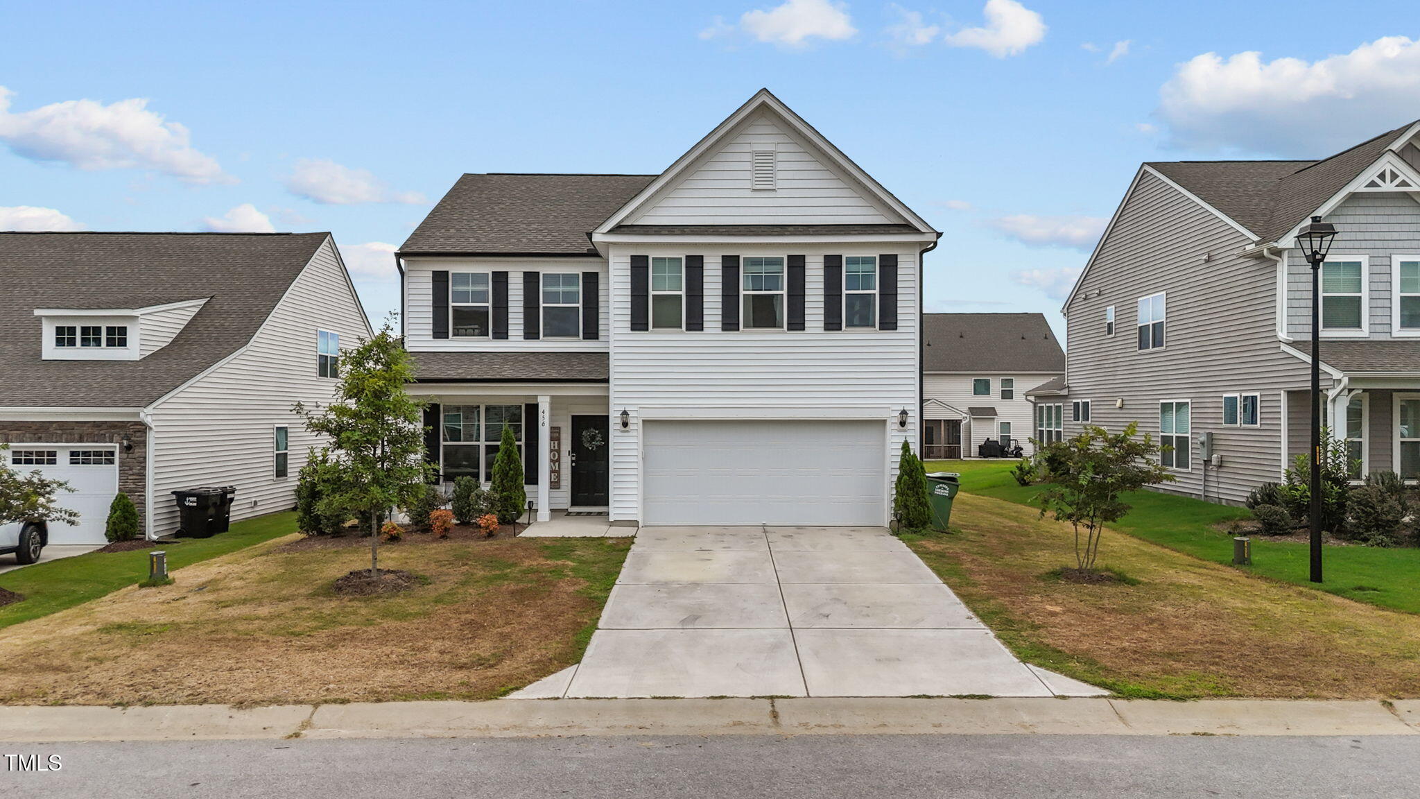 456 Highview Drive Benson, NC 27504 - Photo 9 of 36 front view of a house with a yard