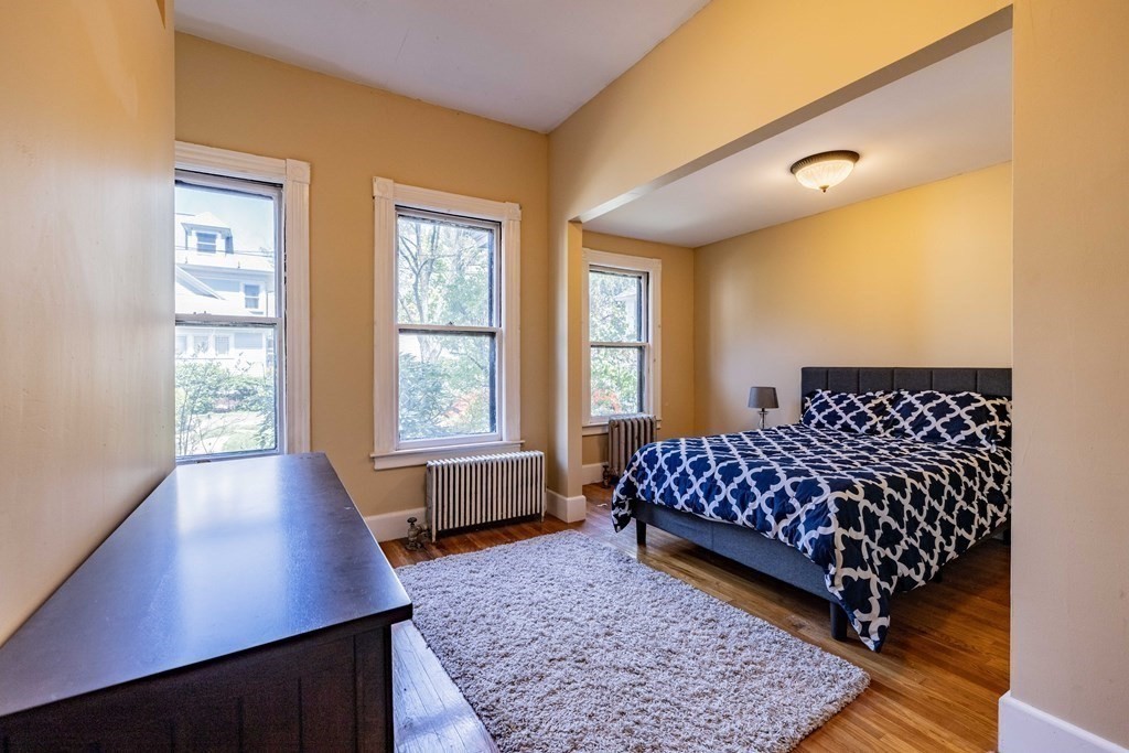 47 Magnolia Terrace Springfield, MA 01108 - Photo 16 of 37 a bed room with a bed and a window