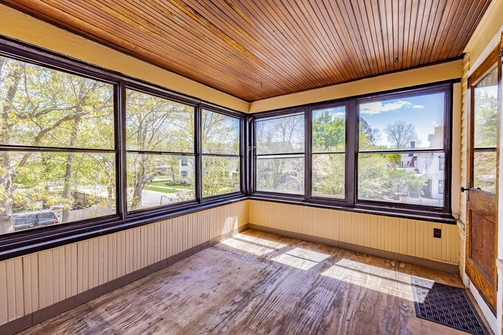 47 Magnolia Terrace Springfield, MA 01108 - Photo 19 of 37 a view of empty room with wooden floor and fan