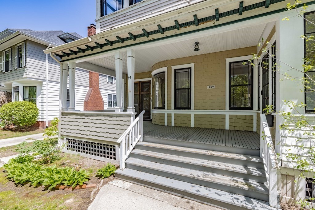 47 Magnolia Terrace Springfield, MA 01108 - Photo 2 of 37 a front view of a house with a porch