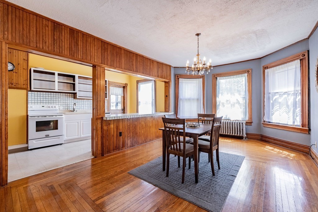 47 Magnolia Terrace Springfield, MA 01108 - Photo 21 of 37 a view of a dining room with furniture window and wooden floor