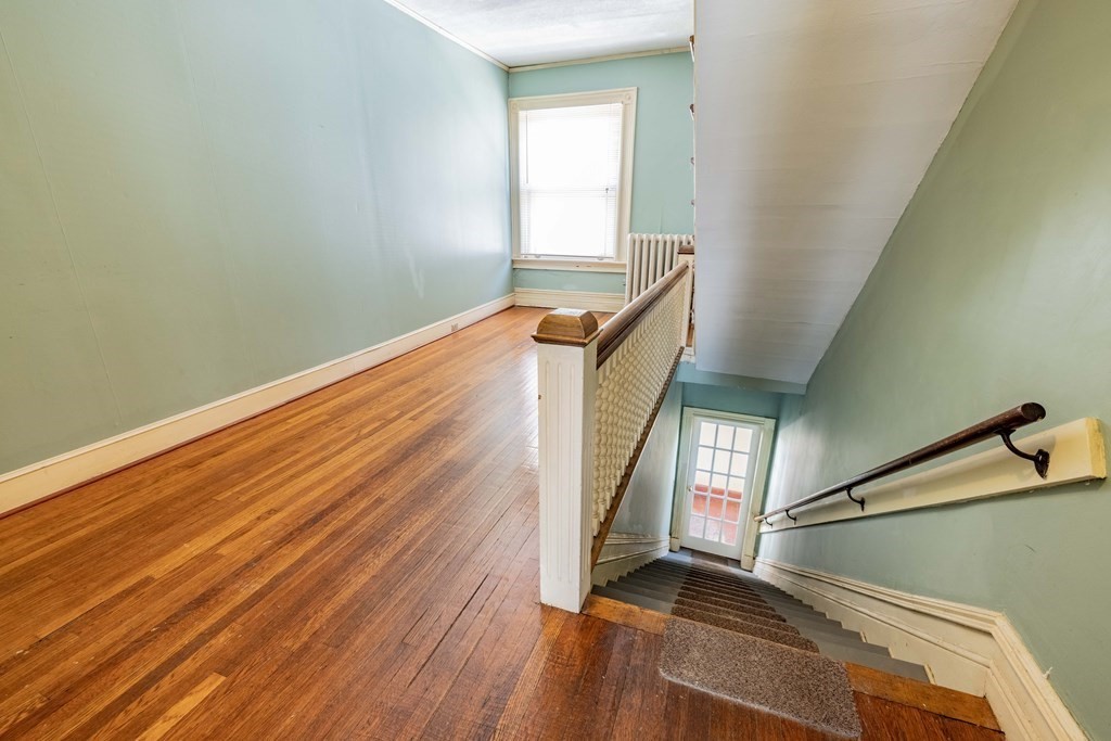 47 Magnolia Terrace Springfield, MA 01108 - Photo 31 of 37 a view of entryway with wooden floor