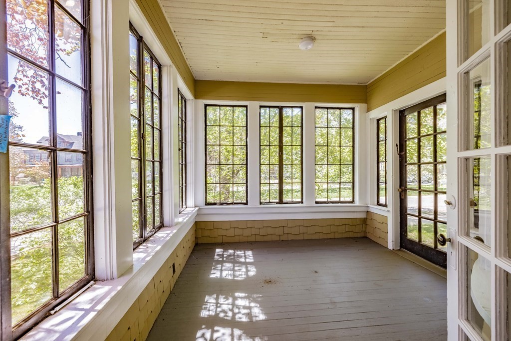 47 Magnolia Terrace Springfield, MA 01108 - Photo 4 of 37 a view of hallway with large windows