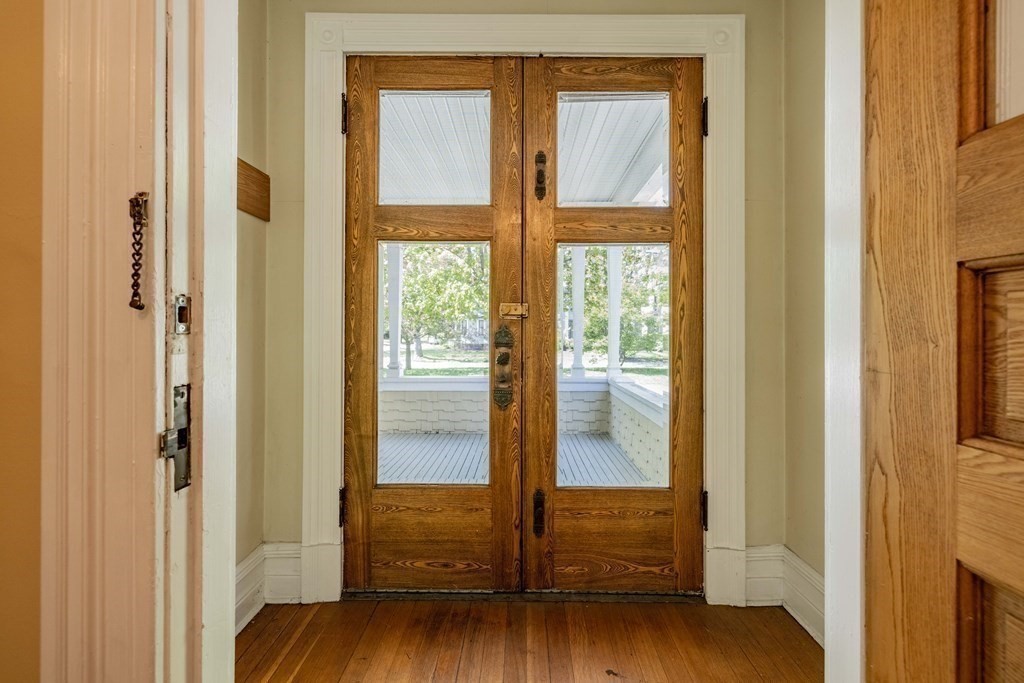 47 Magnolia Terrace Springfield, MA 01108 - Photo 5 of 37 a view of front door with wooden floor