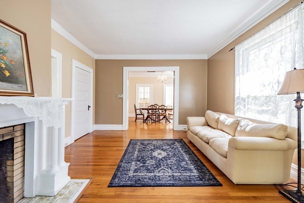 47 Magnolia Terrace Springfield, MA 01108 - Photo 9 of 37 a living room with furniture and a rug