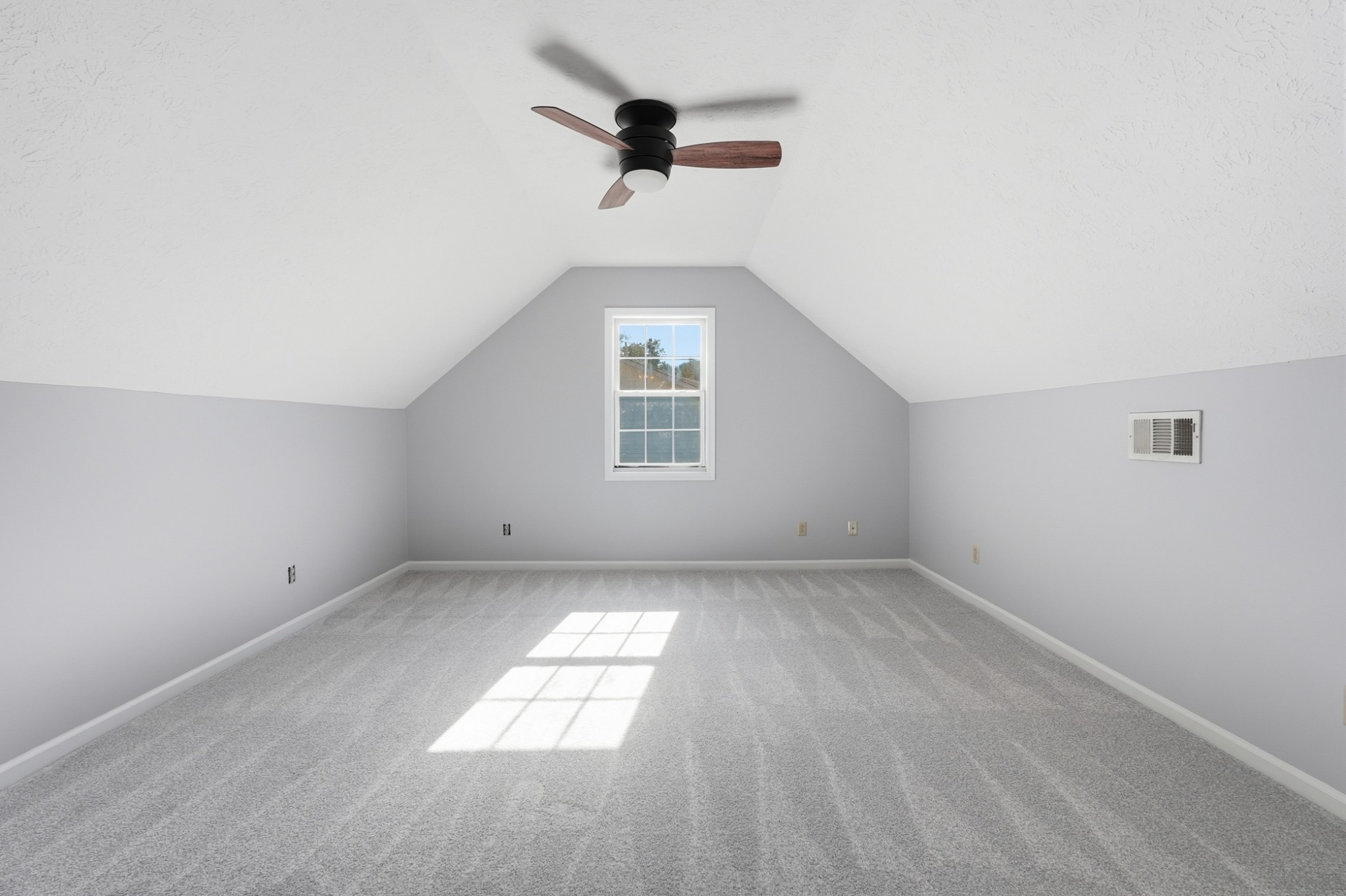 4877 Swafford Road Cookeville, TN 38501 - Photo 14 of 28 an empty room with a window and a ceiling fan