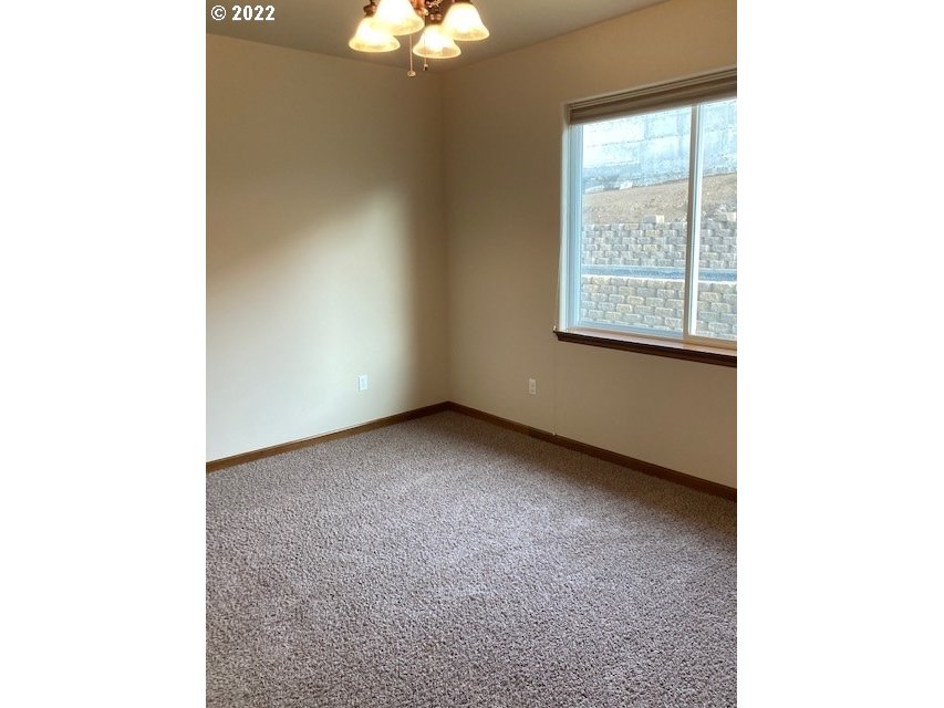 1734 Southwest 3rd Street Pendleton, OR 97801 - Photo 11 of 29 a view of an empty room with a window