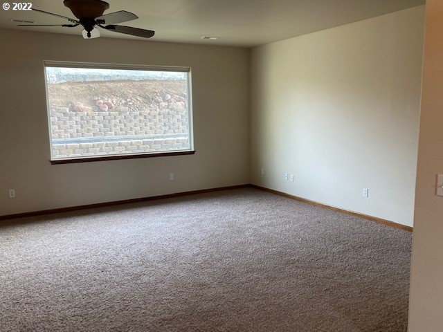 1734 Southwest 3rd Street Pendleton, OR 97801 - Photo 3 of 29 an empty room with a window