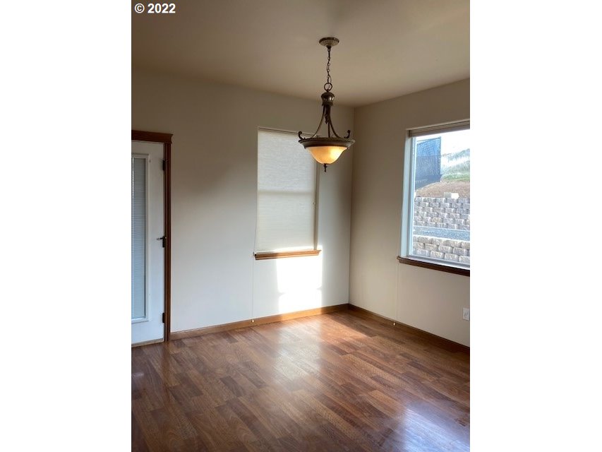1734 Southwest 3rd Street Pendleton, OR 97801 - Photo 5 of 29 a view of an empty room with a window