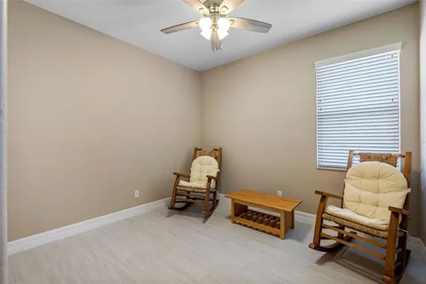 a room with furniture and a window