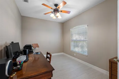 a room with furniture and window