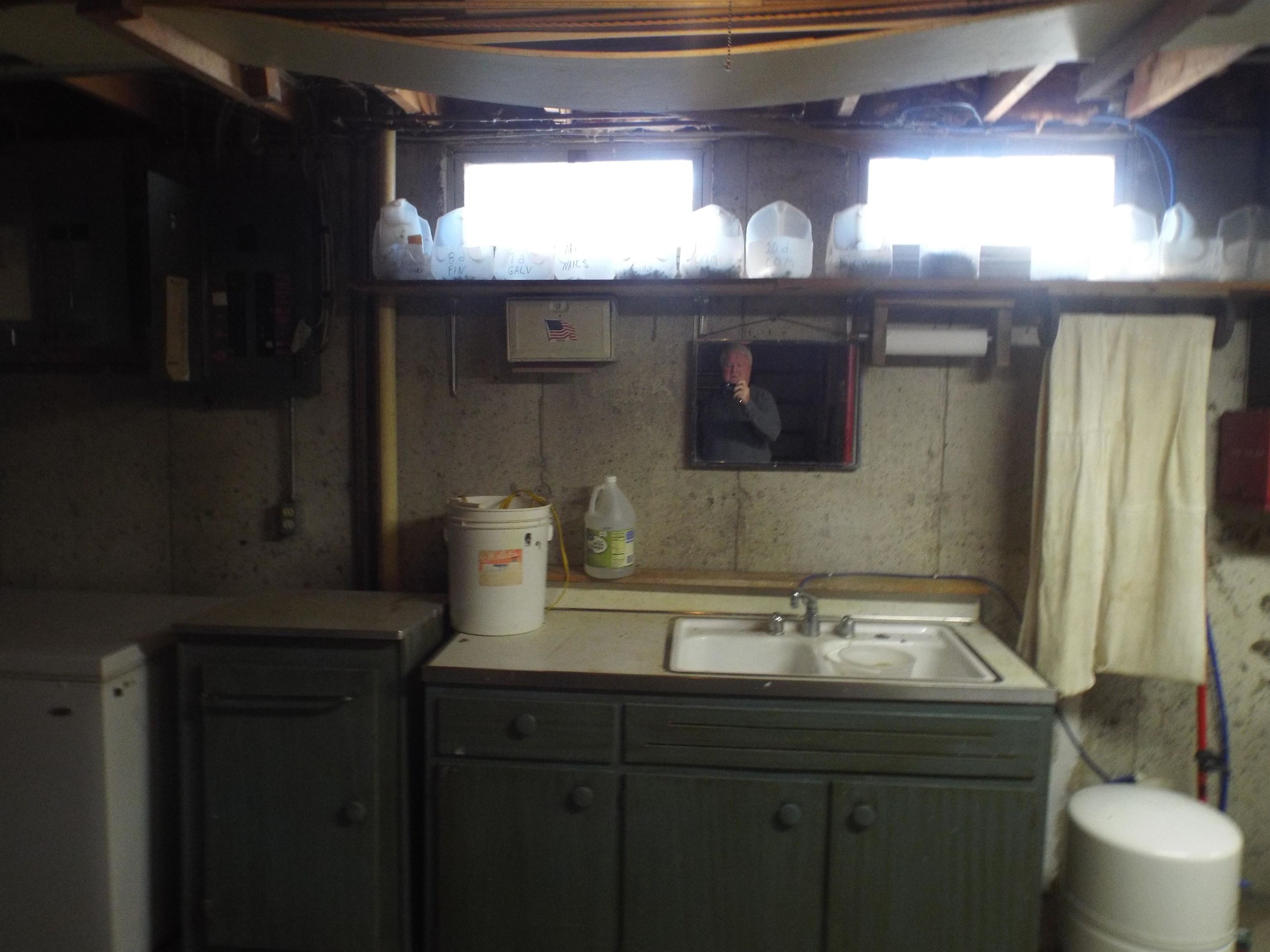 6090 South Rodden Road Hanover, IL 61041 - Photo 14 of 34 a bathroom with a sink and a mirror