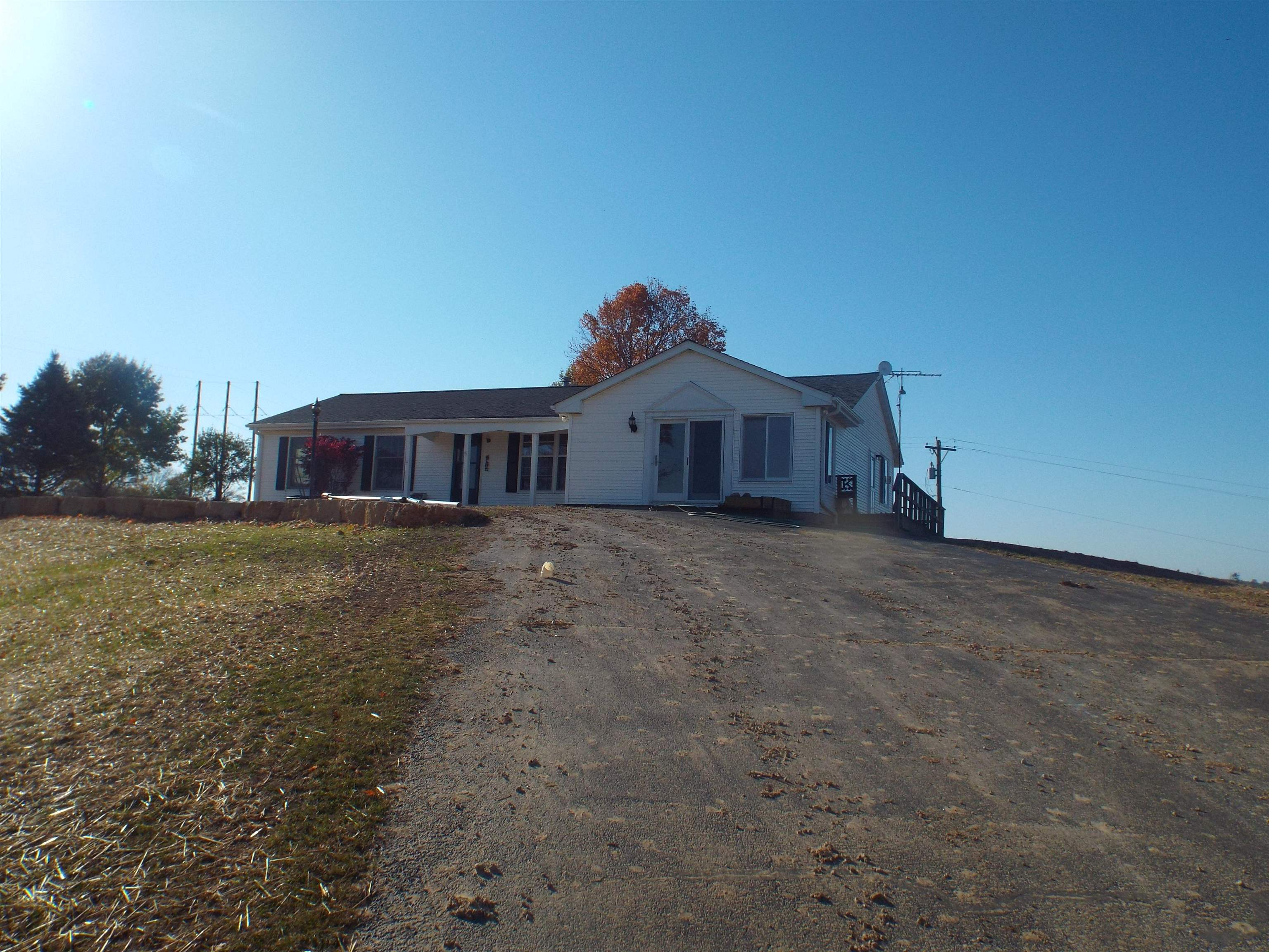 6090 South Rodden Road Hanover, IL 61041 - Photo 26 of 34 a front view of a house with a yard