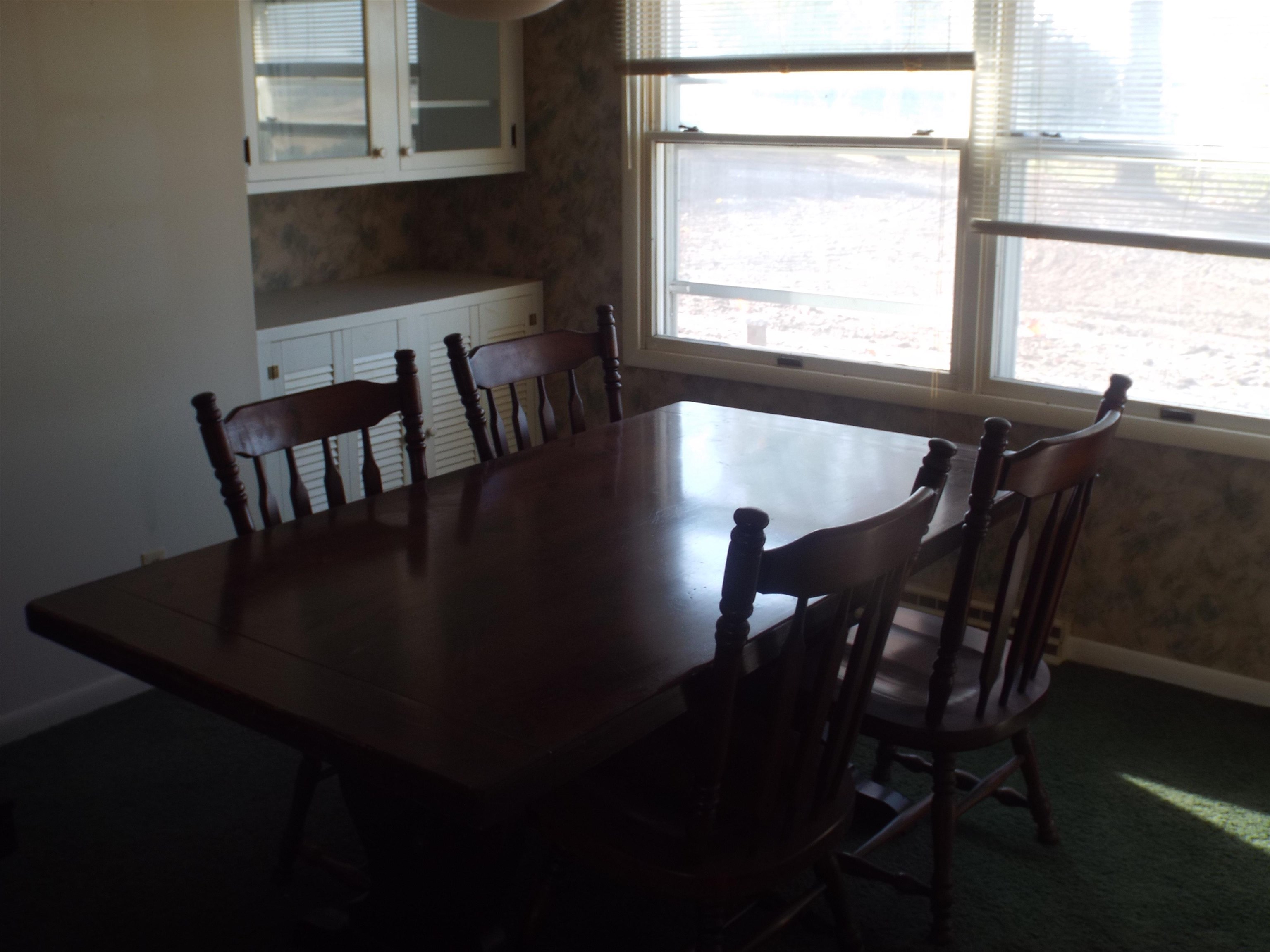 6090 South Rodden Road Hanover, IL 61041 - Photo 5 of 34 a view of a dining room with furniture and window