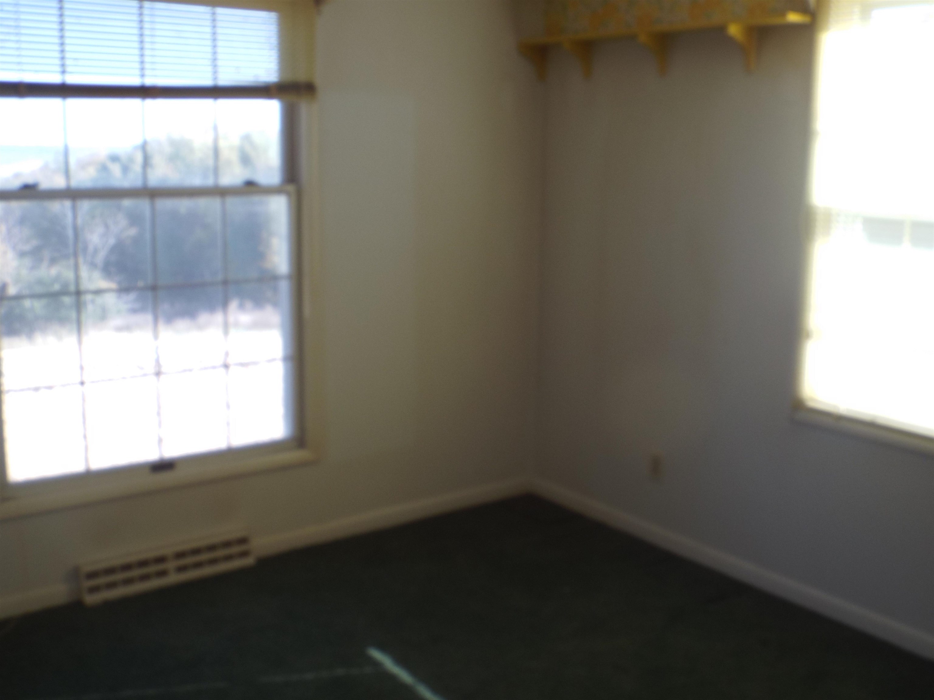 6090 South Rodden Road Hanover, IL 61041 - Photo 10 of 34 a small space with a window