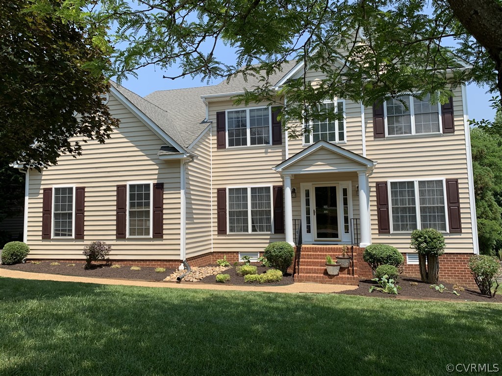 1400 Goswick Ridge Road Midlothian, VA 23114 - Photo 1 of 24 a front view of a house with a yard and outdoor seating