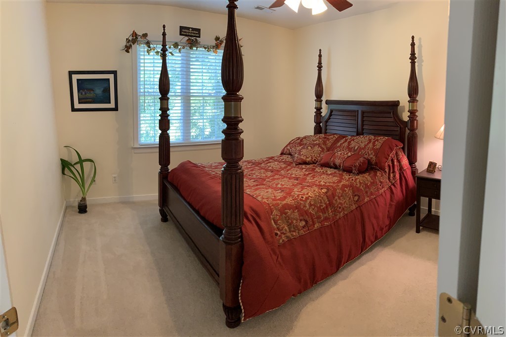 1400 Goswick Ridge Road Midlothian, VA 23114 - Photo 17 of 24 a bedroom with a bed and window