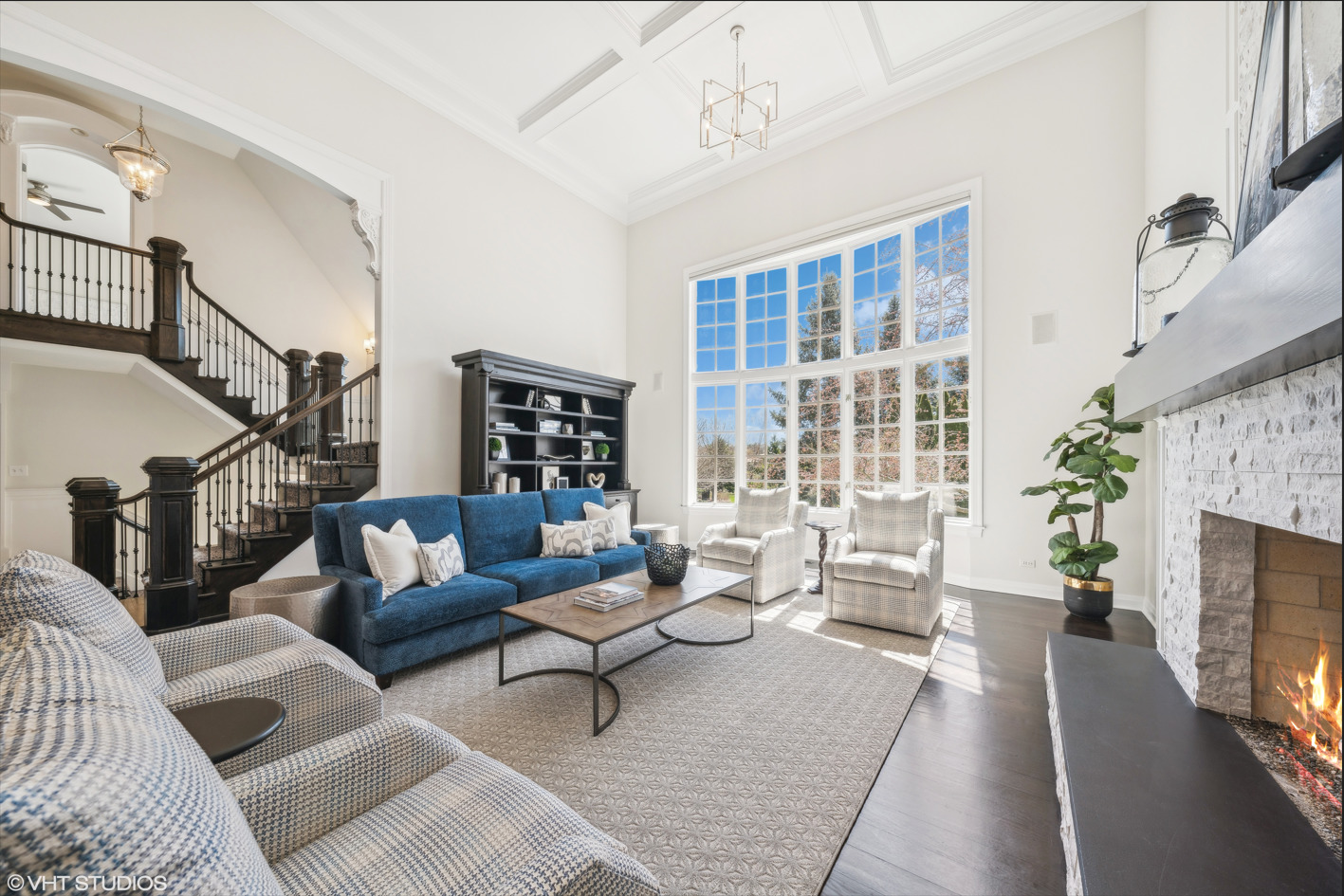 34-w033 White Thorne Road St. Charles, IL 60174 - Photo 17 of 100 a living room with furniture a fireplace and a chandelier