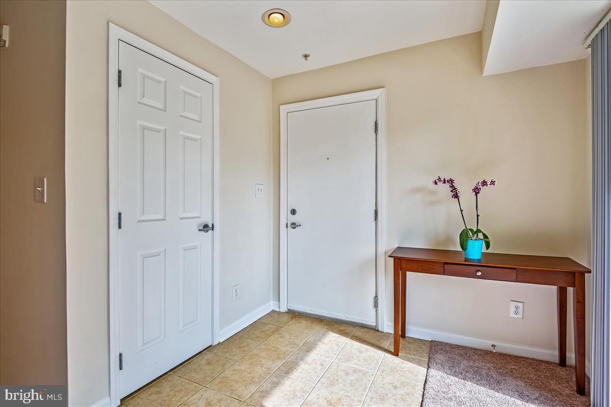 1138 Cove Road, Unit 201 Annapolis, MD 21403 - Photo 22 of 46 Foyer Area with coat closet