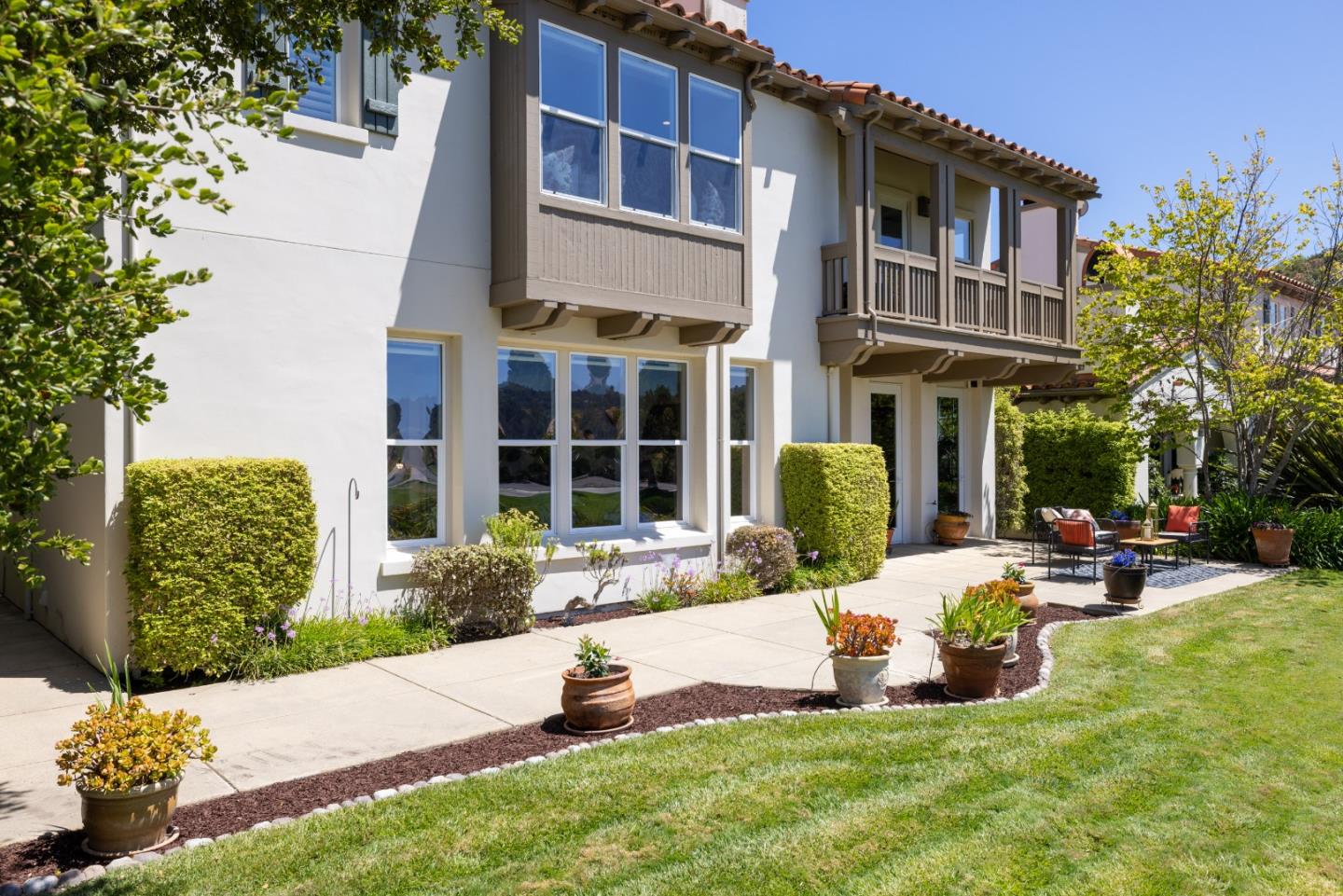302 Pasadera Drive Monterey, CA 93940 - Photo 28 of 40 a view of a house with backyard sitting area and porch