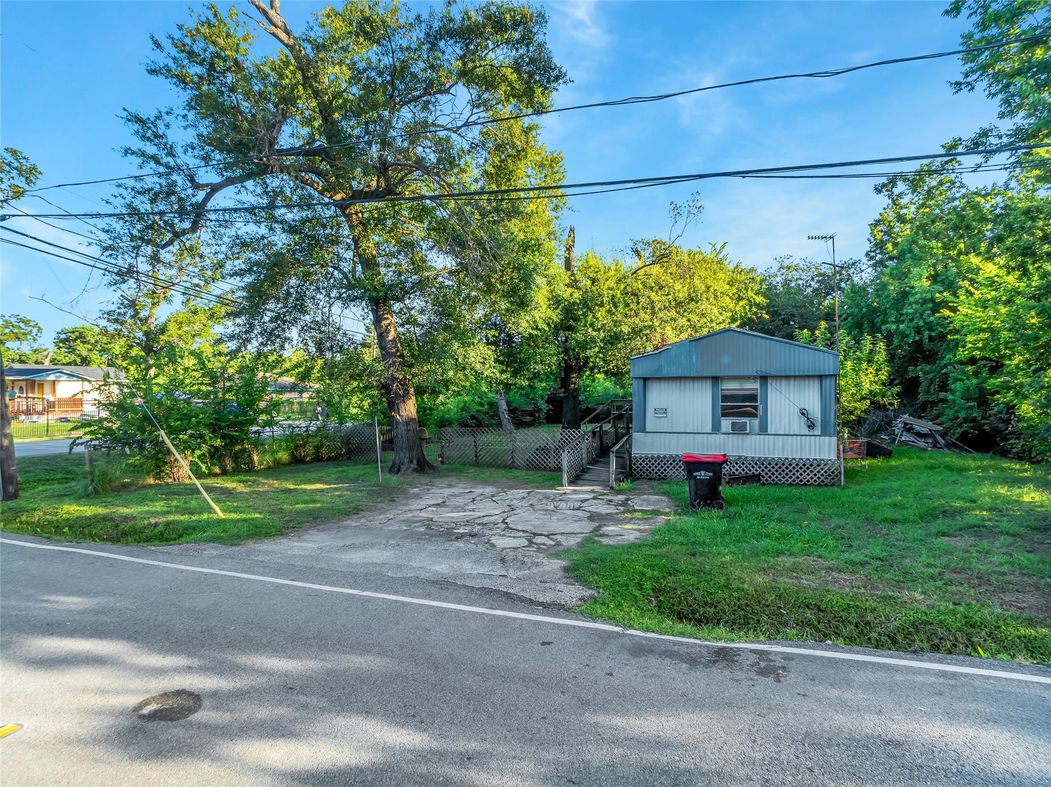 719 Manor Street Houston, TX 77015 - Photo 8 of 24 a front view of house with yard and trees