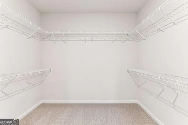 a view of a room with racks on the wall